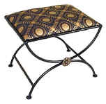 Small wrought iron bench with upholstered seat