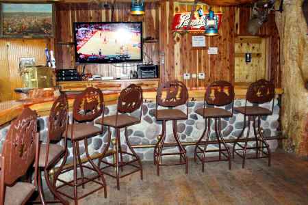 Grace Lodge Bar Stools around rustic bar