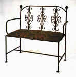 Gothic metal loveseat with upholstered seat cushion