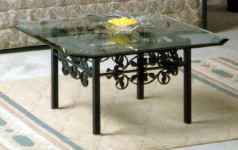 Rose wrought iron cocktail table with beveled glass top